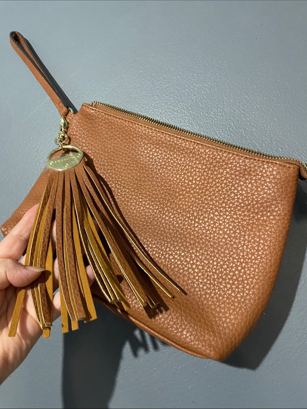 Steve Madden Brown wristlet with Tassel